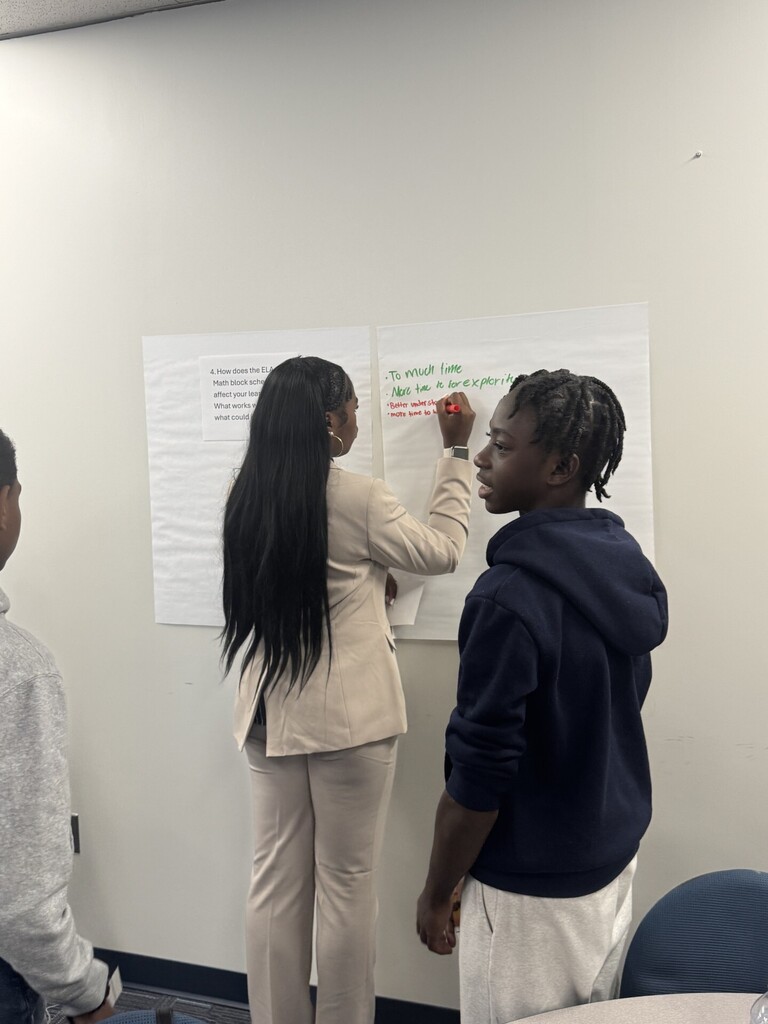 Students at advisory council meeting