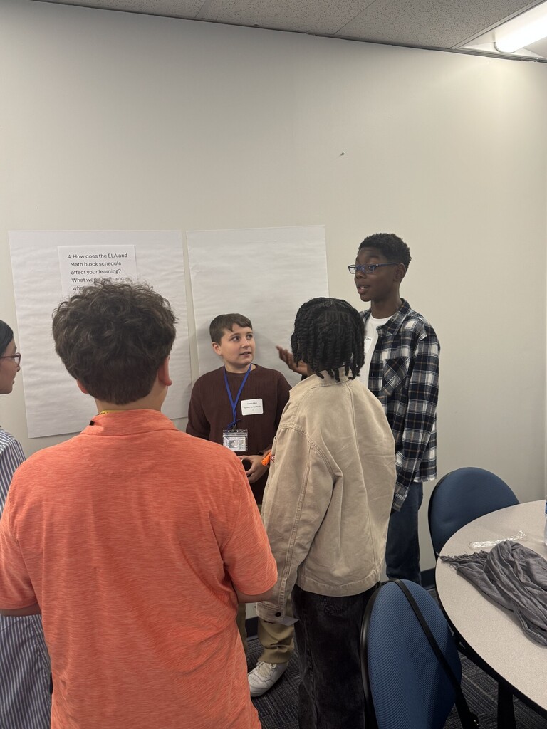 Students at advisory council meeting