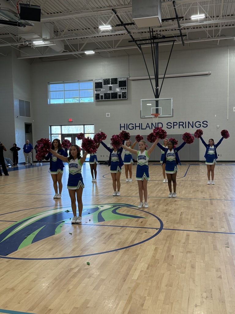 Cheerleaders perform at pep rally