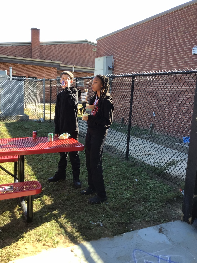Scholars enjoying their snacks.