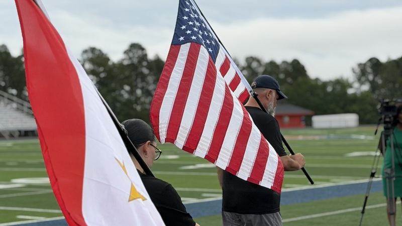 Man running with a flag.