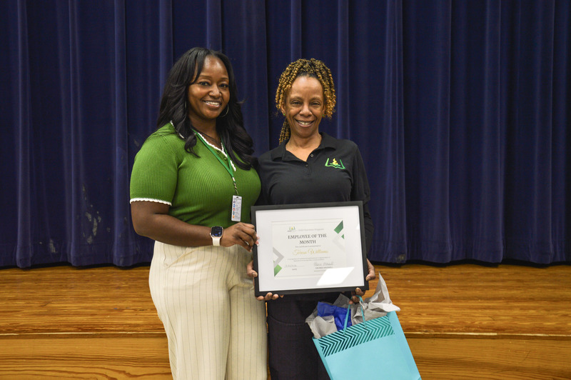 Schofield Middle Child Nutrition Operator Teresa Williams stands with Chartwells Resident District Manager Ebonee Maxwell for a picture