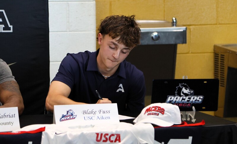 Player at signing. 