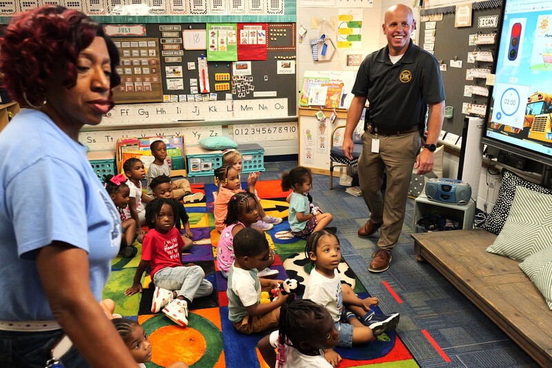 4k students sitting and waiting for more stuffed animals to be passed out.