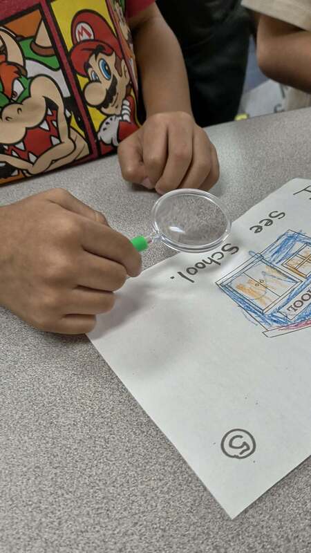 A student is practing writing.