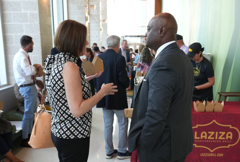 Dr. Murphy speaks with a community leader.
