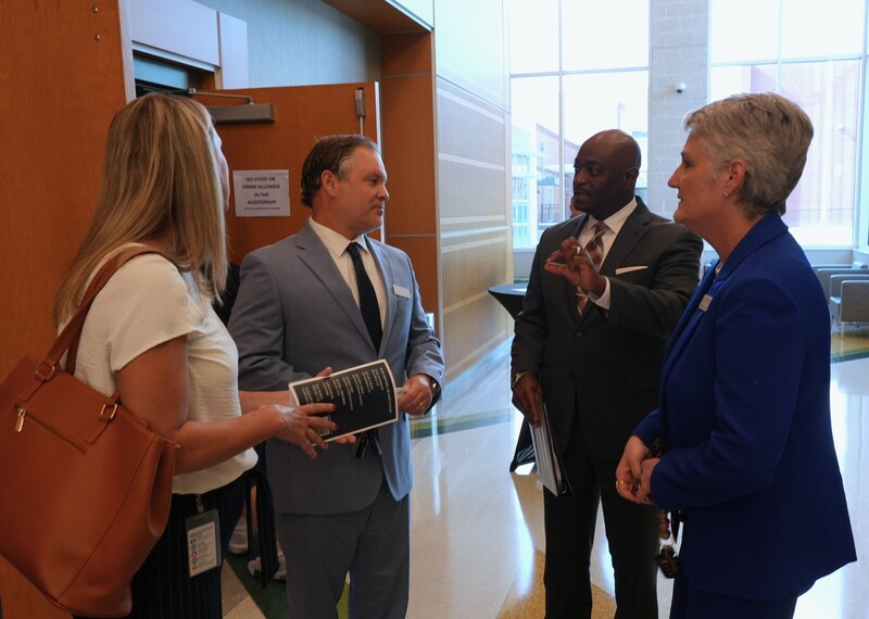 Superintendent Dr. Corey Murphy speaks with District leadership.
