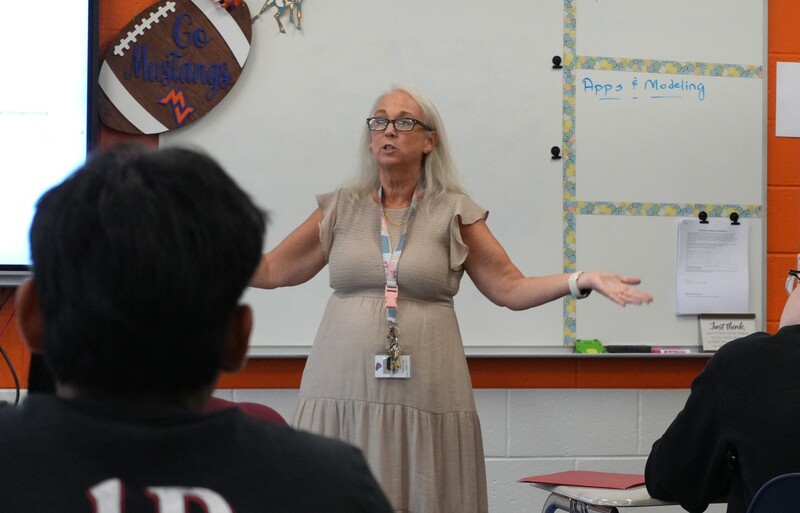 Ginger Proctor speaks to her students.