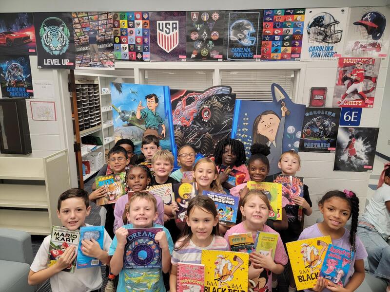 Student with new books