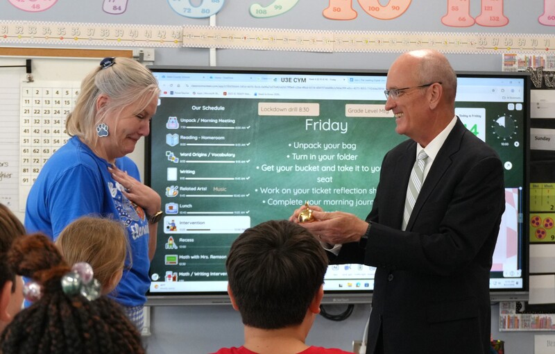 Cassie Remson has an emotinal recation to her Golden Apple Award.