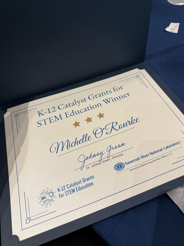 Certificate awarding Michelle O'Rourke Grant.