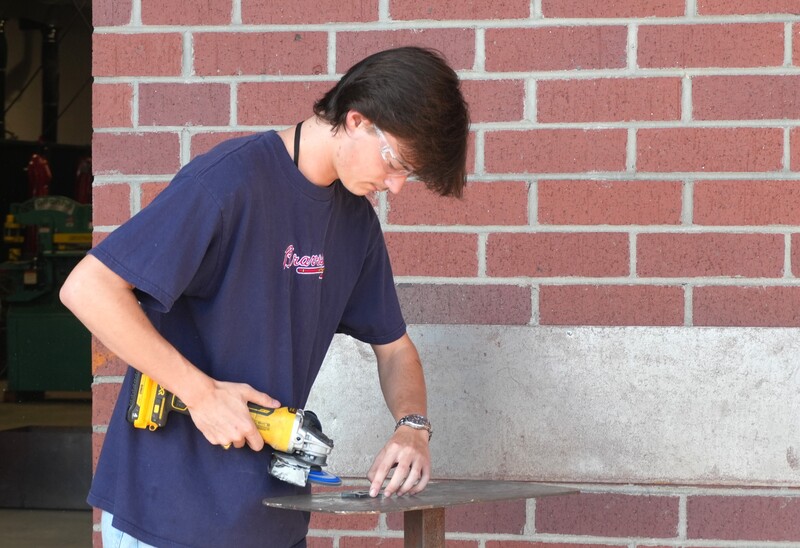 Wagener-Salley student works with welding materials.
