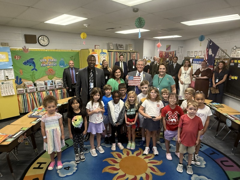Congressman Joe Wilson visits North Augusta Elementary and poses with first grade students, staff and leaders.