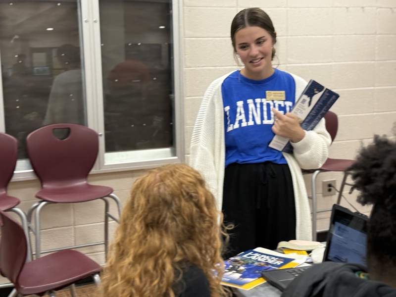College representative talks with South Aiken High Student. 