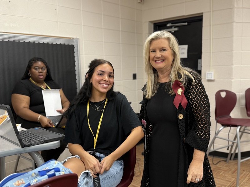 School Counselor and high school student during college application month kickoff.