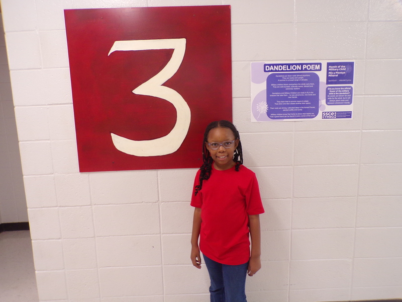 Student wearing red, white, and blue.