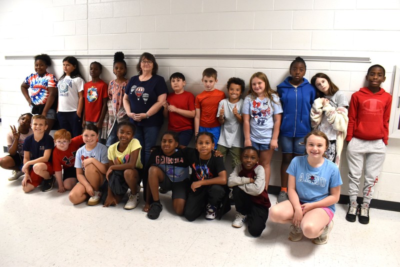 Students and staff wearing red, white, and blue.
