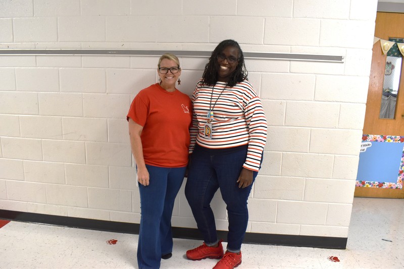 Staff wearing red, white, and blue.