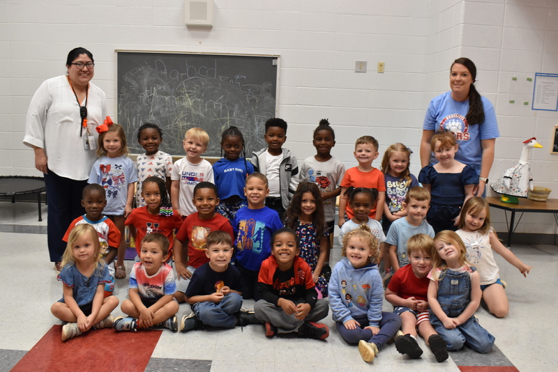 Students and staff wearing red, white, and blue.