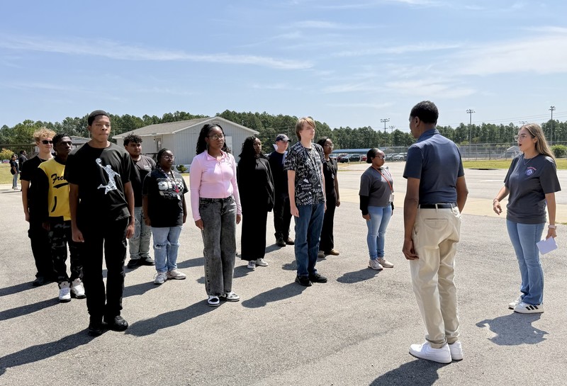 Midland Valley High NJROTC Cadets practicing drills with FOX54 Chief Meteorologist Jay Jefferies.