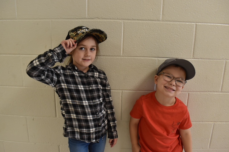 Students wearing hats.