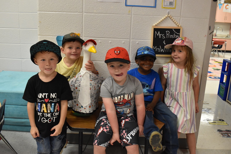 Students wearing hats.