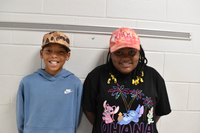 Students wearing hats.