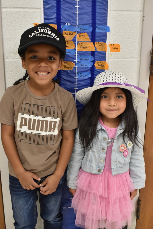 Students wearing hats.