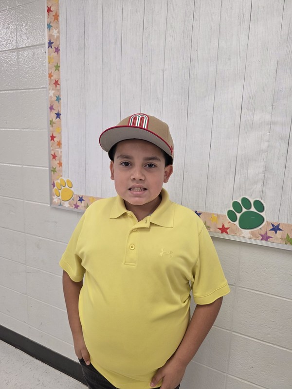 Student wearing hat.