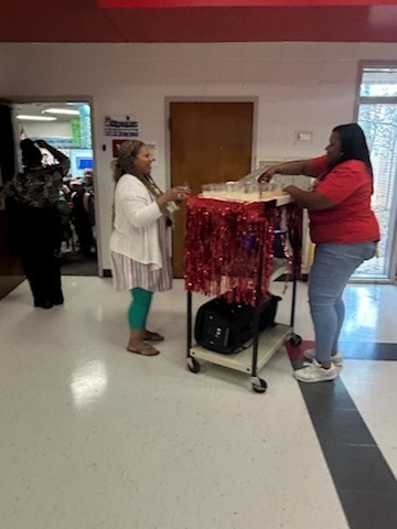 Staff celebrating donations.