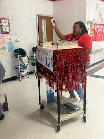 Staff celebrating donations.