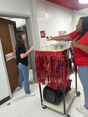 Staff celebrating donations.