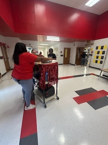 Staff celebrating donations.