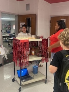 Staff celebrating donations.