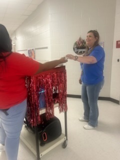 Staff celebrating donations.