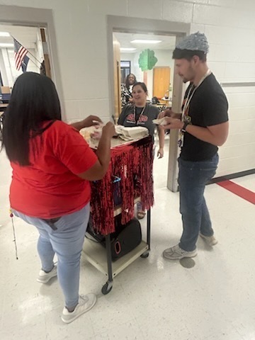 Staff celebrating donations.