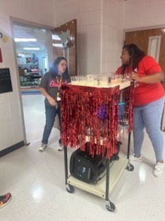 Staff celebrating donations.