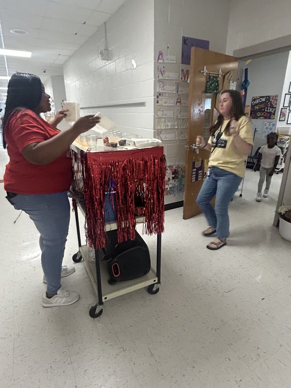 Staff celebrating donations.