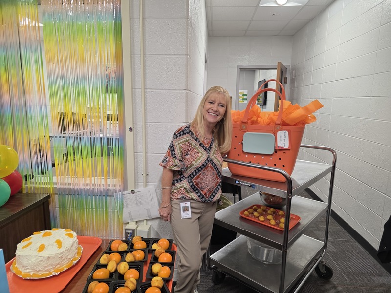 Woman with cart and gifts.