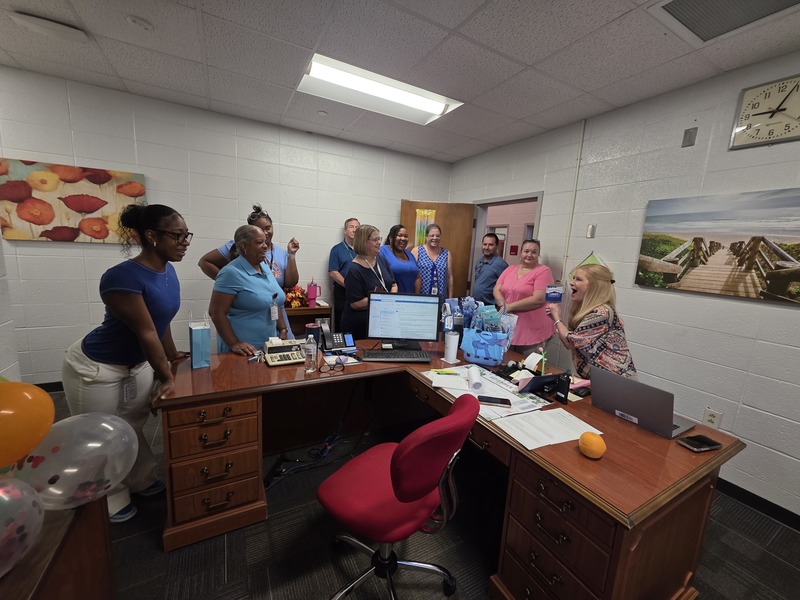 Staff opening gifts.
