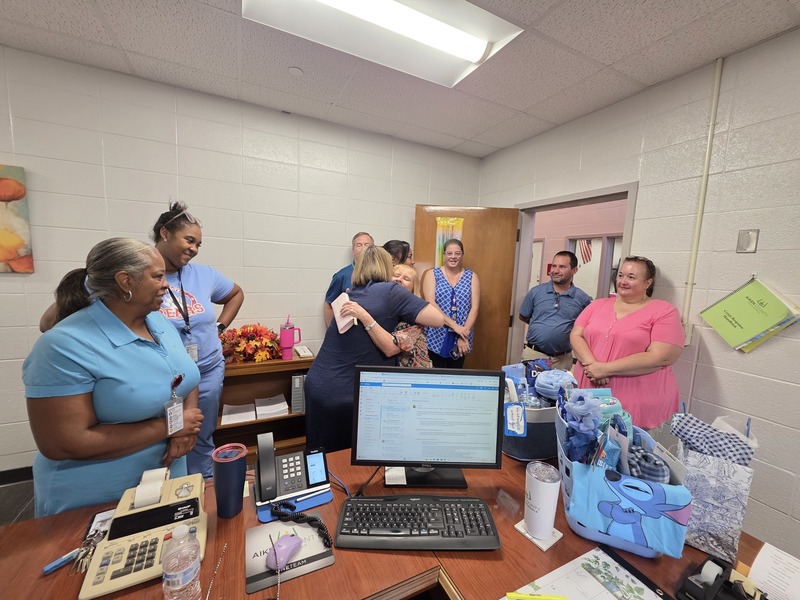 Staff opening gifts.