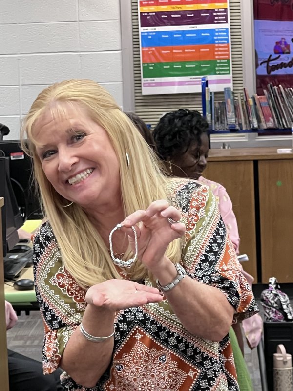 Woman with bracelet.