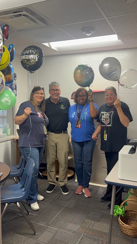 People with balloons.