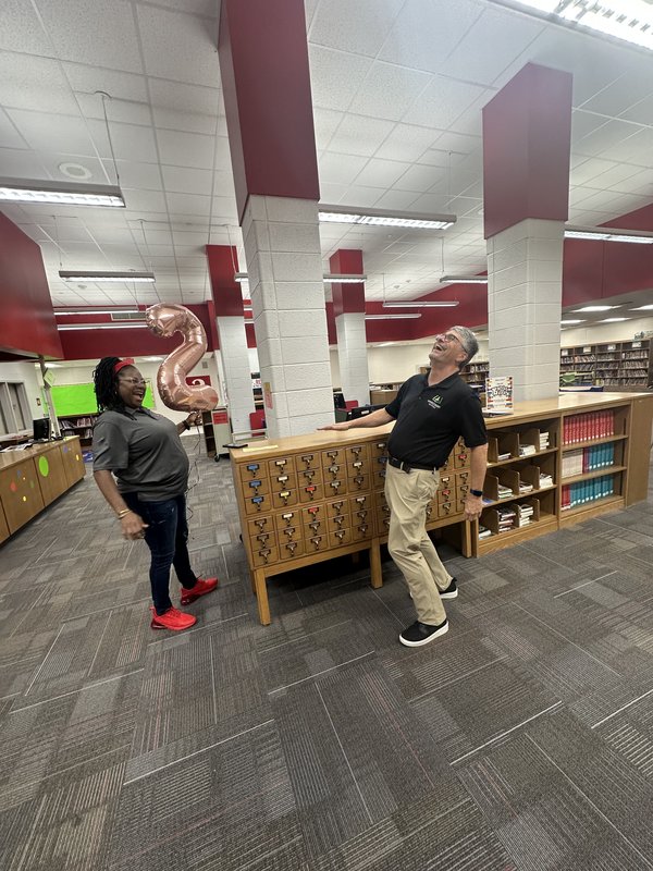 People with balloons.