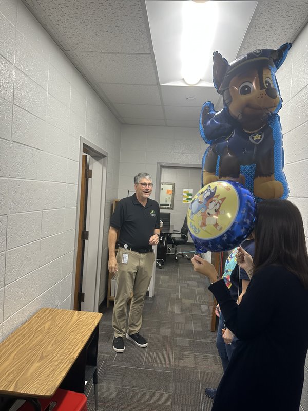 People with balloons.