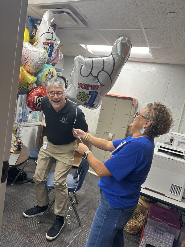 People with balloons.