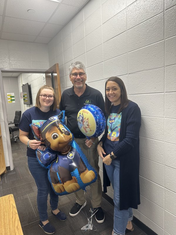 People with balloons.