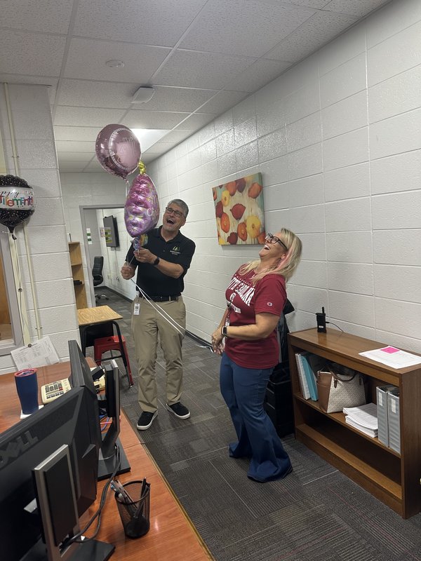 People with balloons.