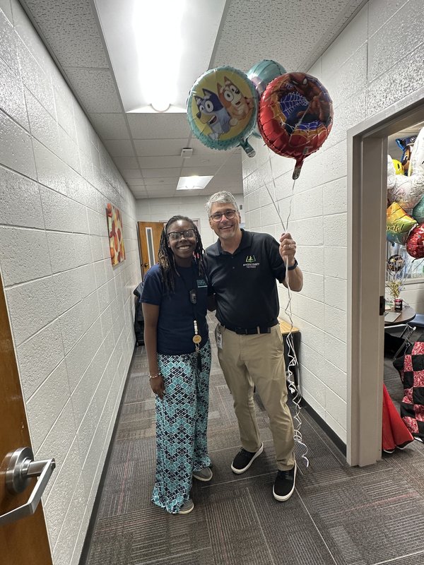 People with balloons.