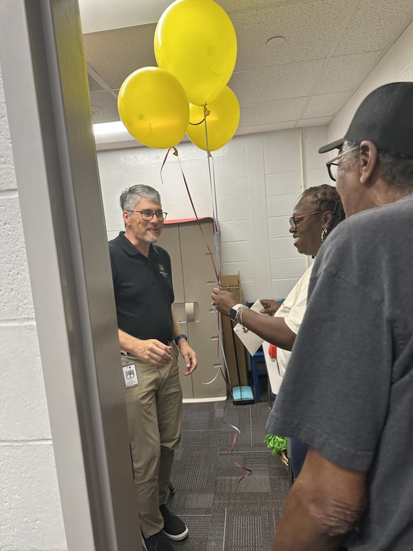 People with balloons.